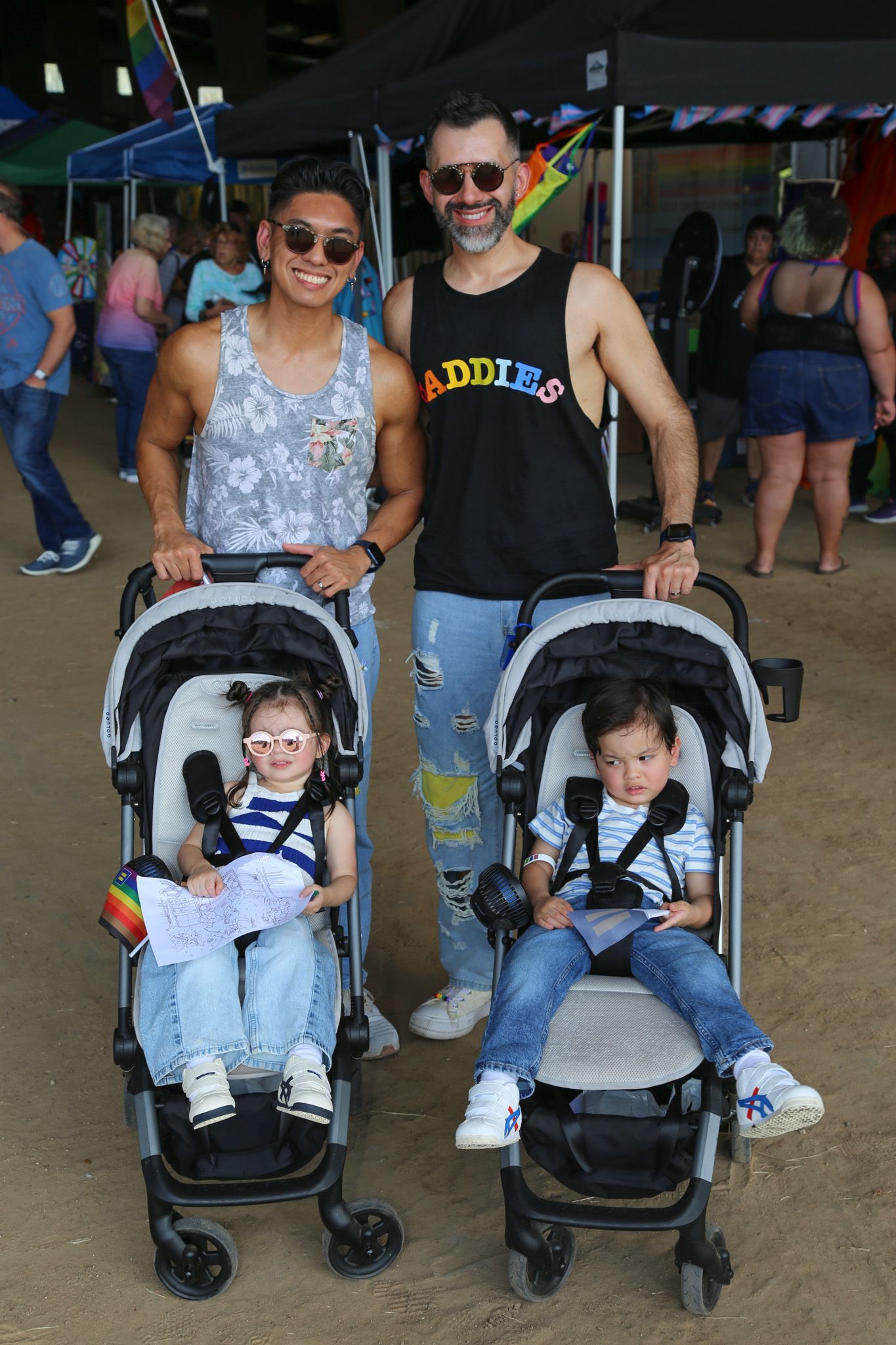 Family with children in strollers at Katy Pride 2025